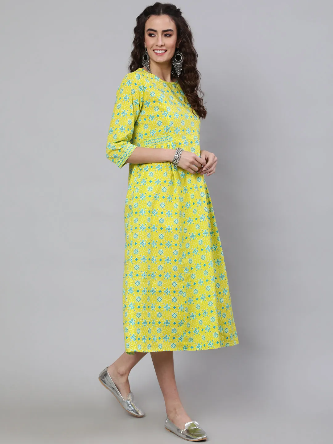 Wome Yellow Ethnic Printed Flared Dress With Three Quarter Sleeves